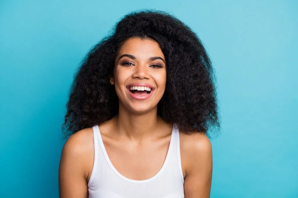 Happy couple smiling outdoors - Sunrise Dental Arts Care Close-up portrait of her she nice attractive lovely winsome lovable, cheerful cheery wavy-haired girl wearing modern fashionable makeover isolated over bright vivid shine vibrant blue color background