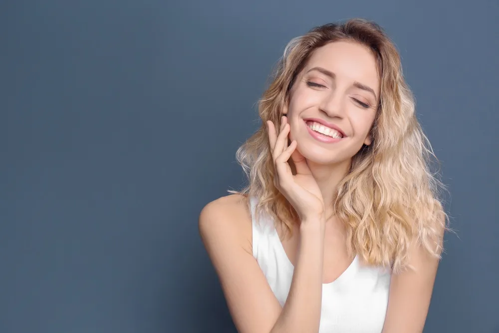 Woman smiling - Porcelain Veneers in Hillcrest